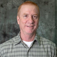 head shot of Bob Blum against a grey background