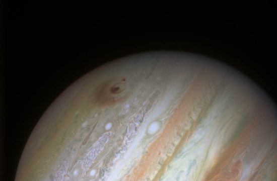 Photo of Jupiter with a red scar from the comet collision