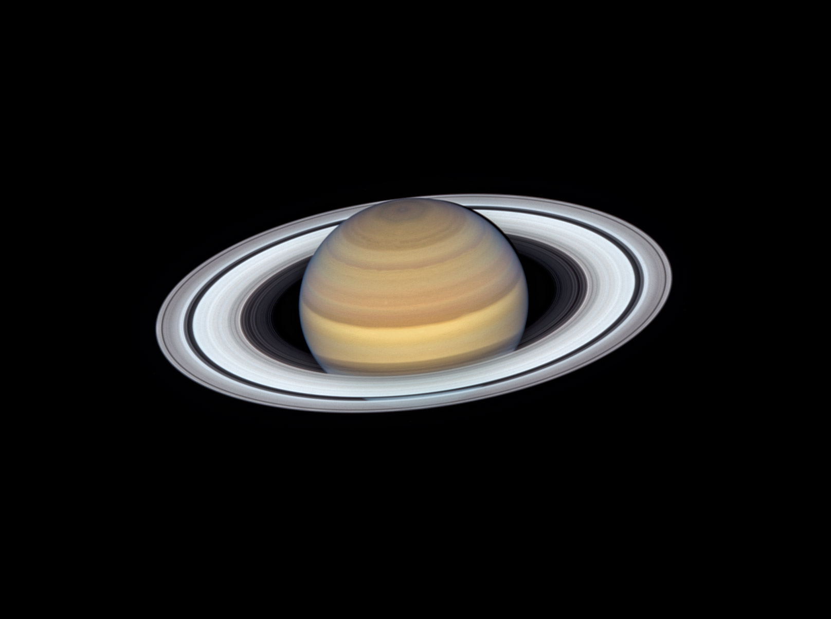 saturn and its rings on a back background