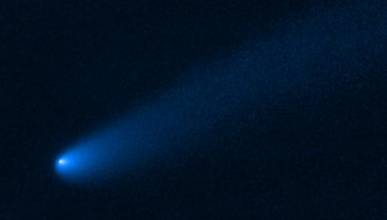 STScI: Comet Makes a Pit Stop Near Jupiter's Asteroids