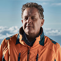 Matt Mountain in an orange jacket