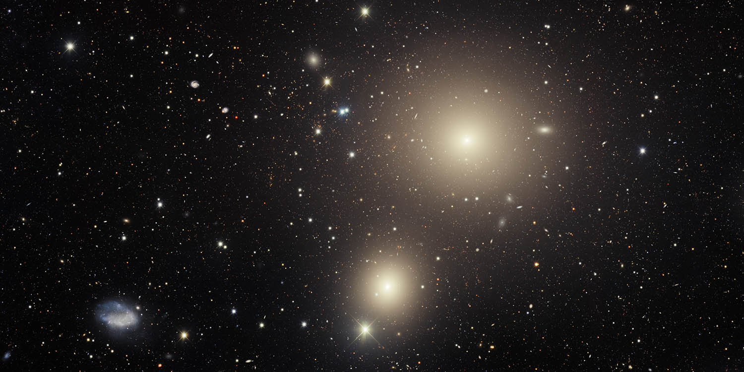 Members of the Fornax galaxy cluster fill this image from the Víctor M. Blanco 4-meter Telescope at Cerro Tololo Inter-American Observatory (CTIO), a Program of NSF’s NOIRLab.