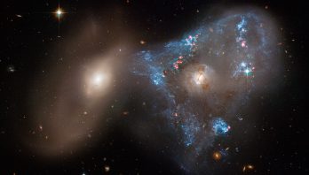 STScI: Galaxy Collision Creates 'Space Triangle' in New Hubble Image