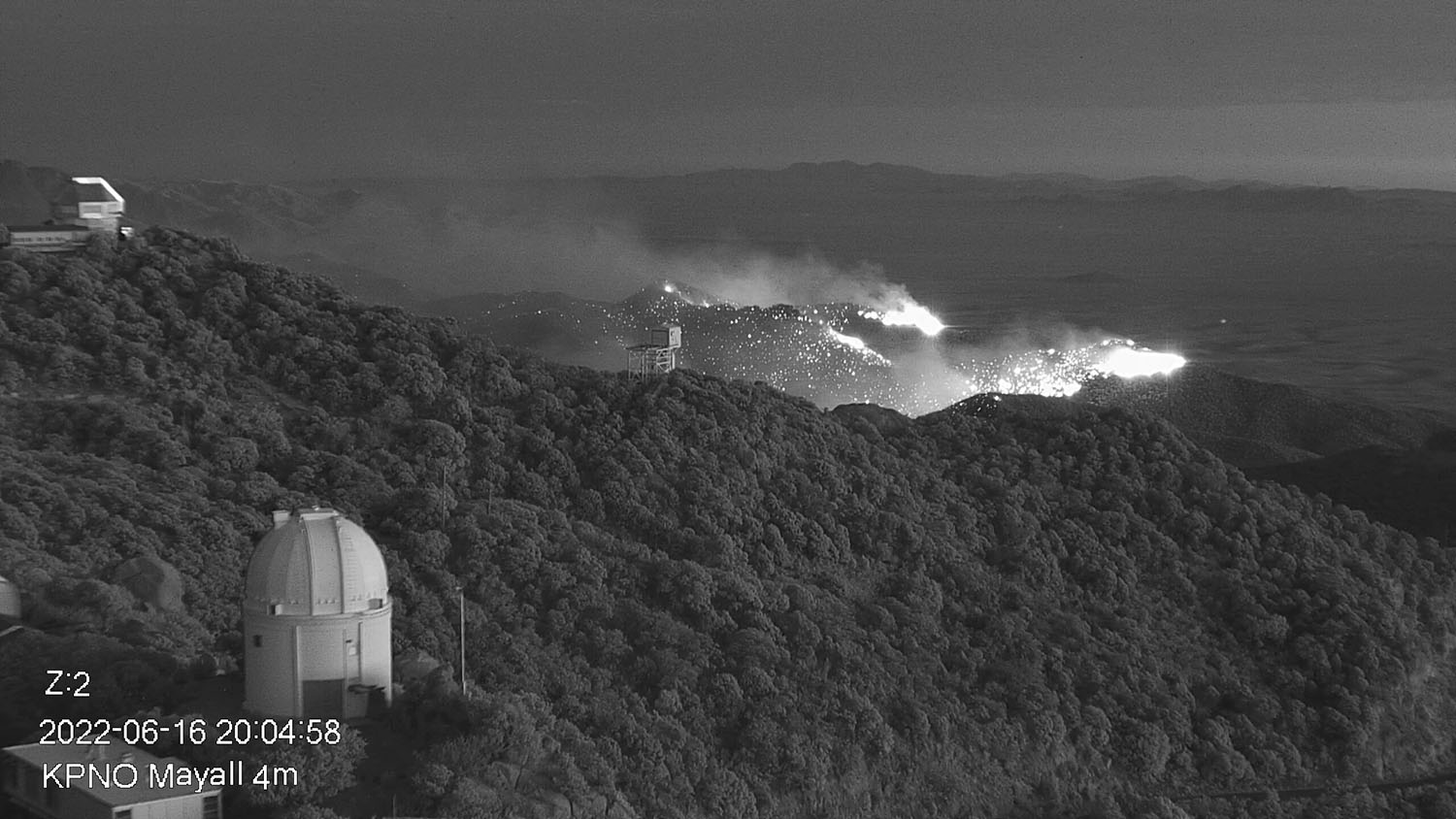 Part of the Contreras Fire burning on the slopes of the Kitt Peak mountain on Thursday evening 16 June 2022. Credit:KPNO/NOIRLab/NSF/AURA