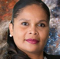 Sandra Perkins Headshot agains a starry background.