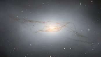 Gemini South Captures Twisted Dusty Disk of NGC 4753, Showcasing the Aftermath of Past Merger