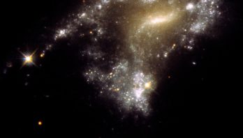 NASA's Hubble Traces 'String of Pearls' Star Clusters in Galaxy Collisions