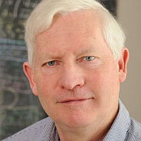 Head shot of man with white hair